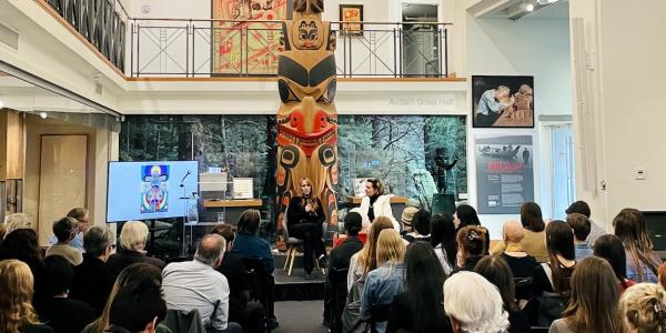 Dr. Melissa Perreault (centre left) and Dr. Judy Illes discuss Two Eyed Seeing in neuroscience with an audience at the Bill Reid Gallery of Northwest Coast Art in Vancouver during Brain Awareness Week in 2023. (Photo courtesy of Dr. Melissa Perreault)