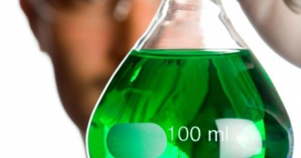 Lab flask with green liquid